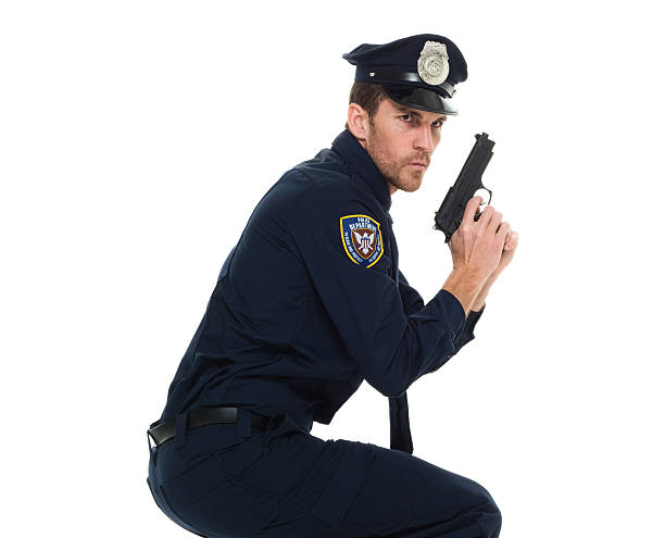 istock Police in action with gun 533236916