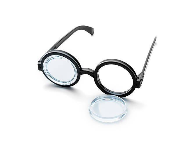 istock Broken black round glasses isolated on white 533242435