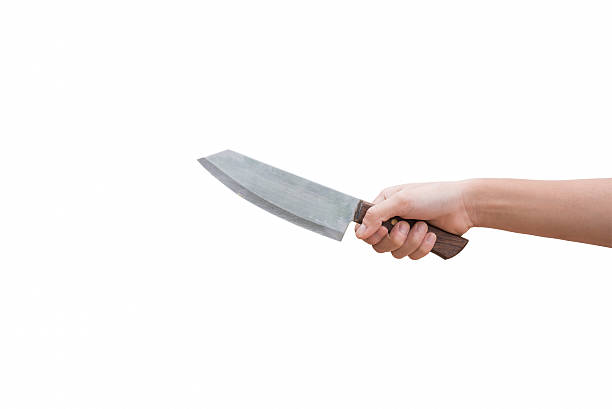 istock Knife in hand ready to stab isolated on white background 533243230