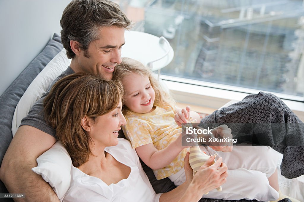 Parents and with their daughter 2015 Stock Photo