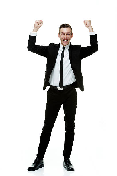 istock Cheerful businessman cheering with hands raised 533245157