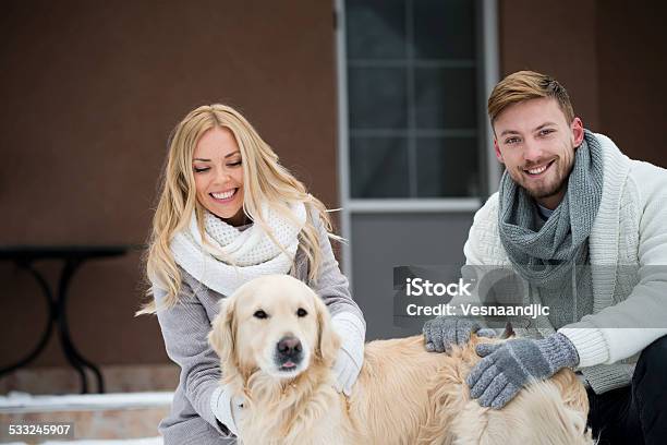 Cheerful Couple With Dog Stock Photo - Download Image Now - Blond Hair, Women, 2015