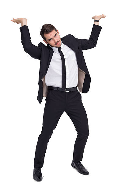 istock Businessman in suit lifting up something heavy 533248101