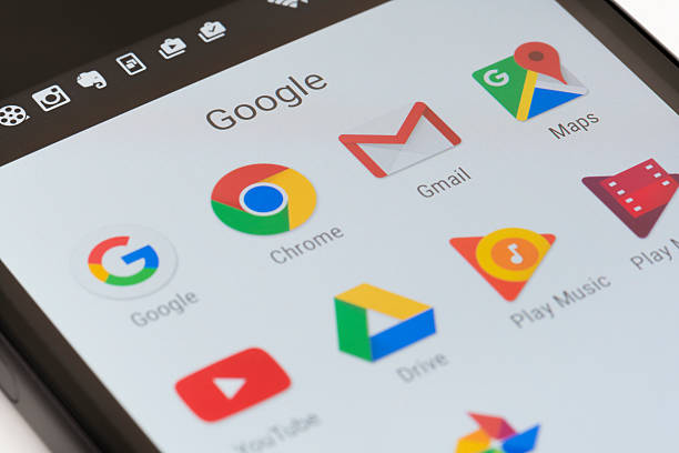 Google apps on Android phone Melbourne, Australia - May 23, 2016: Close-up view of Google apps on an Android smartphone, including Chrome, Gmail, Maps. chrome stock pictures, royalty-free photos & images