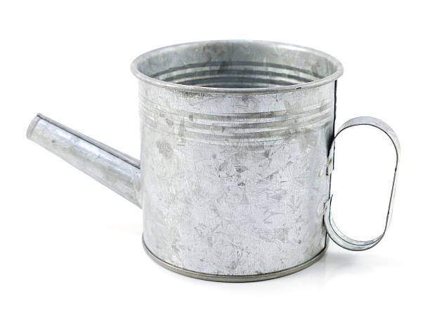istock classic metal watering can isolated on white background 533251170