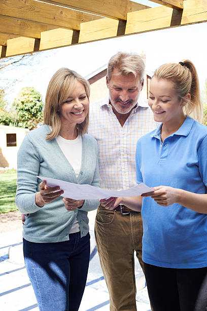 istock Mature Couple Discussing Plan With Landscape Gardener 533251492