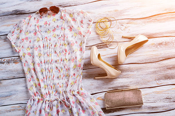 istock Blouse, sunglasses and heel shoes. 533254388