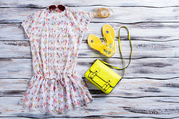 istock Blouse, flip flops and purse. 533254736