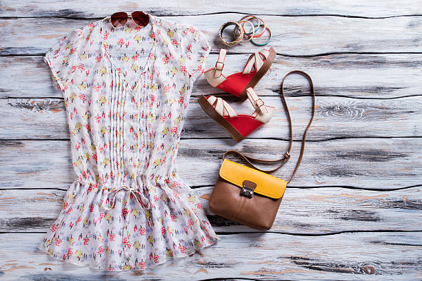 istock V-neck blouse and wedge sandals. 533255244