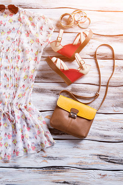 istock Blouse, wedge sandals and bracelets. 533255444