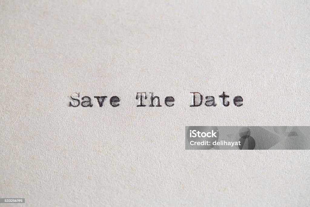 Save The Date Save The Date written with a typewriter on white paper Calendar Date Stock Photo