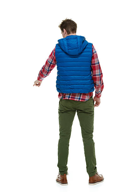 istock Rear view of hipster pointing 533256201