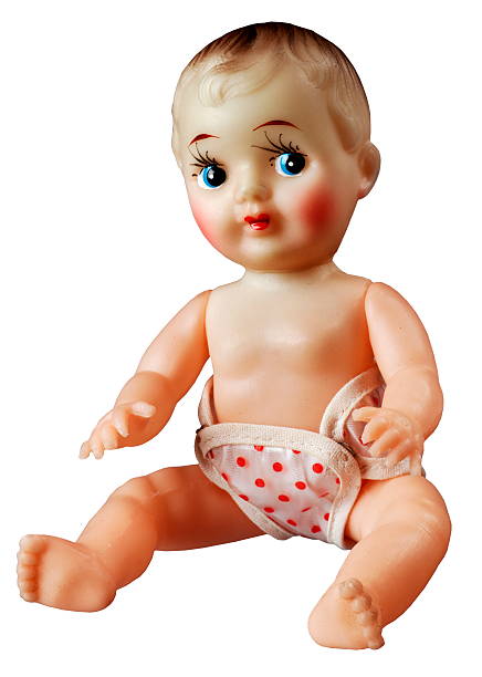Little girl carrying her loving doll