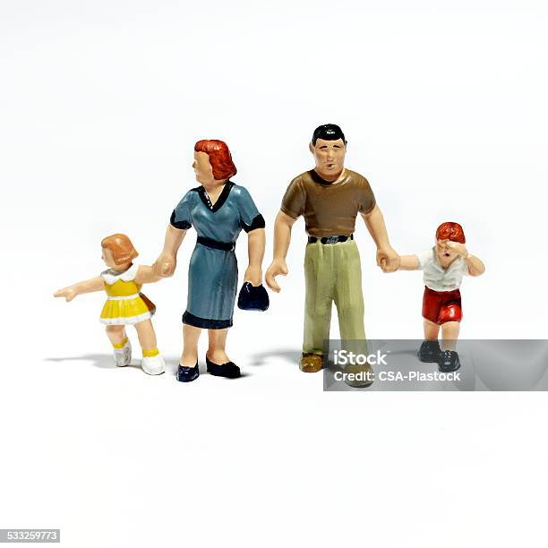 Plastic Figurines Of A Family Stock Photo - Download Image Now - Figurine, Child, Parent