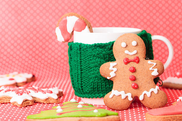istock cup of tea and christmas cookies 533259945