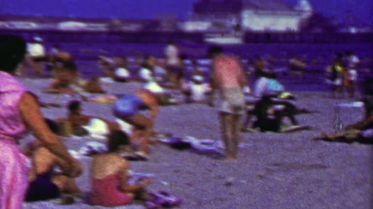 1965: Brighton beach coney island crowds hot summer day.
