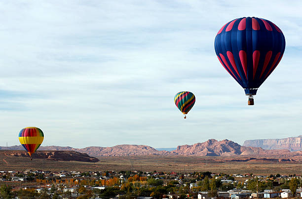 Hot Air Balloon Race PAGE, ARIZONA -- NOVEMBER 3, 2010 -- Hot air balloons take off from Page, Arizona -- near Lake Powell. page arizona stock pictures, royalty-free photos & images