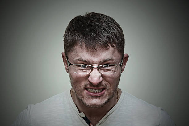 istock Aggressive brutal man with glasses 533274403