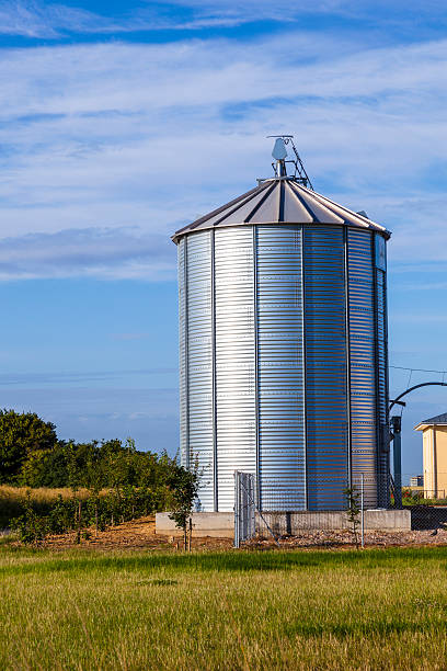 istock silver silo in rural landscape 533275003
