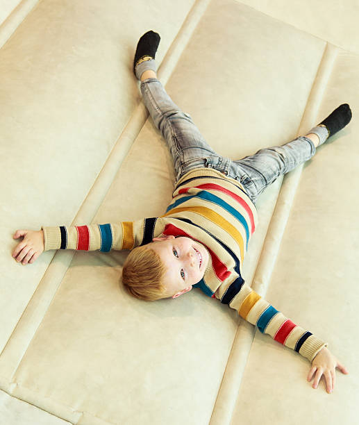 istock Preschooler boy lying on inflatable mattress 533276819