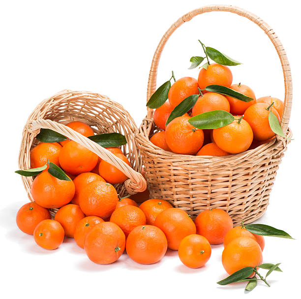 istock ripe tangerines with green leaves in a two basket 533276995