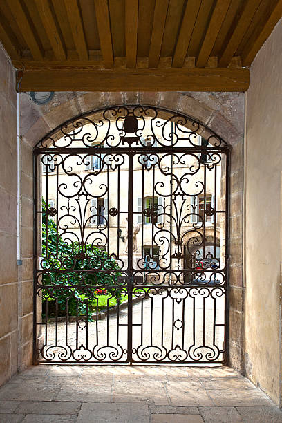 istock window with iron window grate in famous hospice 533277433