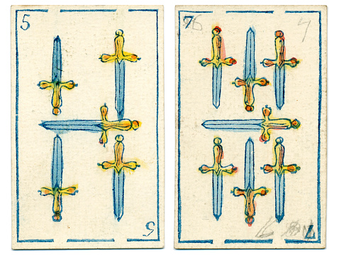These are the five and the seven of Spades / swords (Espadas) from a pack of Mexican Spanish playing cards dated 1846. These cards belong to a baraja Espanola (Spanish deck of cards with a traditional design). The four suits are oros (gold coins), copas (cups or trophies), espadas (swords) and bastos (clubs or batons). The suit shown here is espadas (swords, the equivalent of spades). A full deck consists of 40 cards because there are no 8s or 9s, and the first court card counts as number 10 (not 11). Packs of this kind, based on the Italian card system, have been around since the 15th century. Baraja (Spanish decks) are also used like tarot cards in fortune telling / cartomancy / divination.