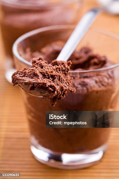 Spoon Full Of Chocolate Mousse Stock Photo - Download Image Now - Chocolate Mousse, Spoon, Drinking Glass