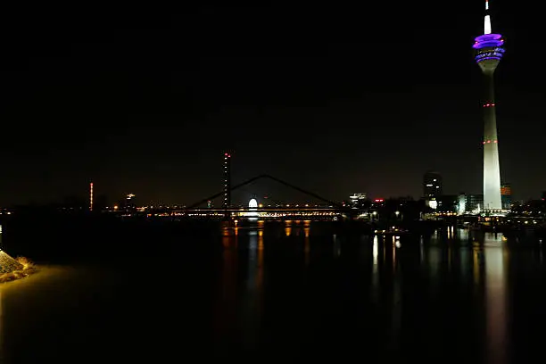 Düsseldorf at night with radio tower and fantastic play of light. Düsseldorf is considered one of the most versatile cities in Germany and part of it can be seen in this photo.