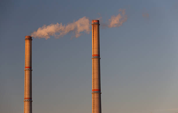 istock Industrial scenery with smoke from coal powered plant 533294757