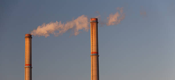 istock Industrial scenery with smoke from coal powered plant 533294767