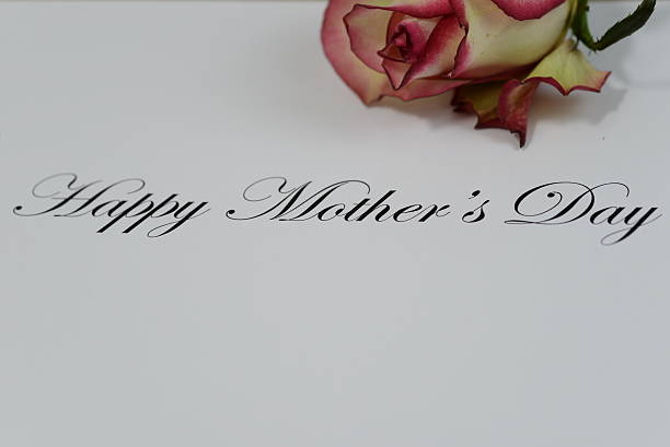 istock Mother's Day with single rose 533295085