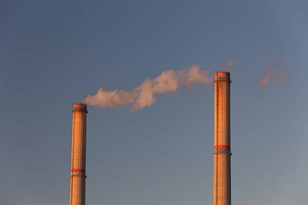 istock Industrial scenery with smoke from coal powered plant 533295357