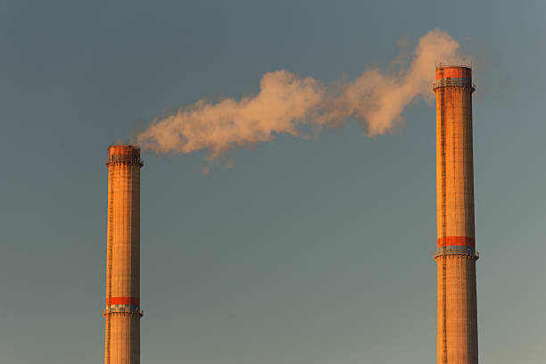 istock Industrial scenery with smoke from coal powered plant 533295373
