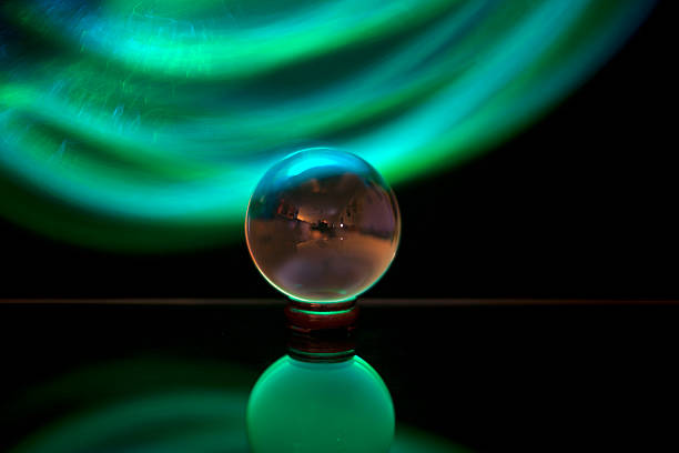 crystal ball lit with green fibre optics