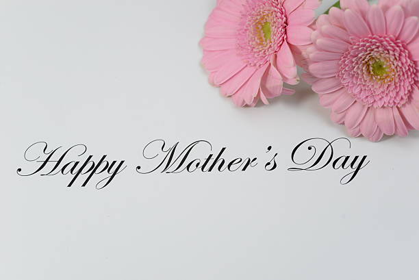 istock Happy Mother's Day with two pink gerberas 533297407