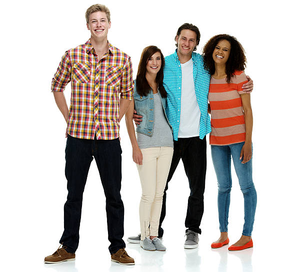 istock Smiling four people standing together 533310837