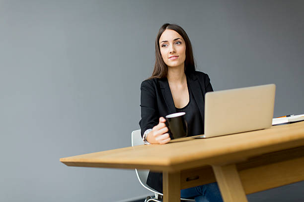 istock Young woman in the office 533311589