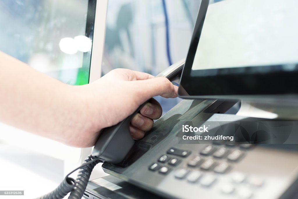 hand using videophone on exhibition. 2015 Stock Photo