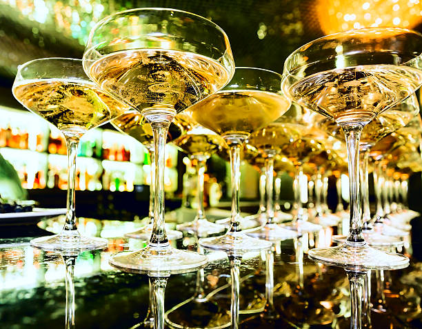 istock Glasses of champagne on bar 533313797