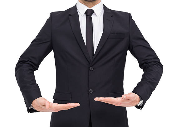istock Mid section of a businessman holding something 533315215