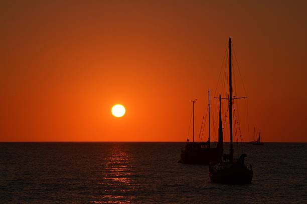 istock Mediterranean sea. Boats at sunset 533316193