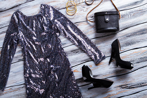 istock Sparkly dress and dark shoes. 533326544