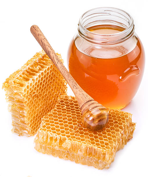 istock Jar full of fresh honey and honeycombs. 533326760