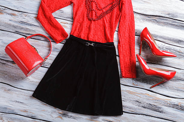 istock Black skirt and red bag. 533327752