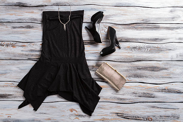 istock Black evening dress and heels. 533327904