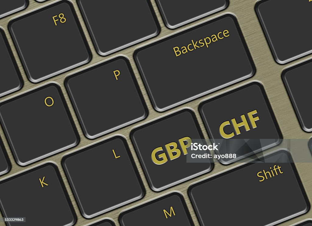 computer keyboard with euro and pound sterling buttons closeup of computer keyboard with swiss franc and pound sterling buttons 2015 Stock Photo