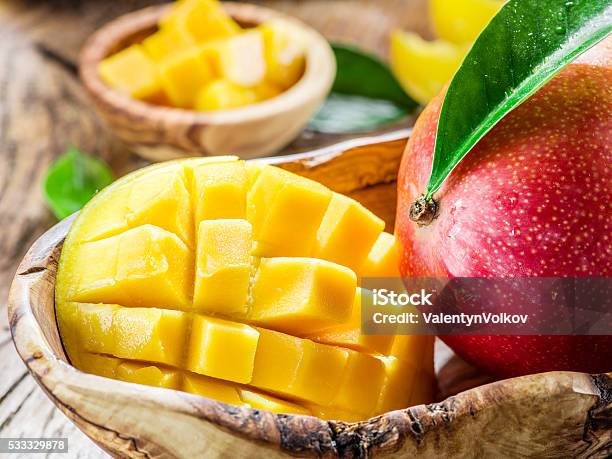 Mango Fruit And Mango Cubes Stock Photo - Download Image Now - Backgrounds, Cross Section, Cube Shape