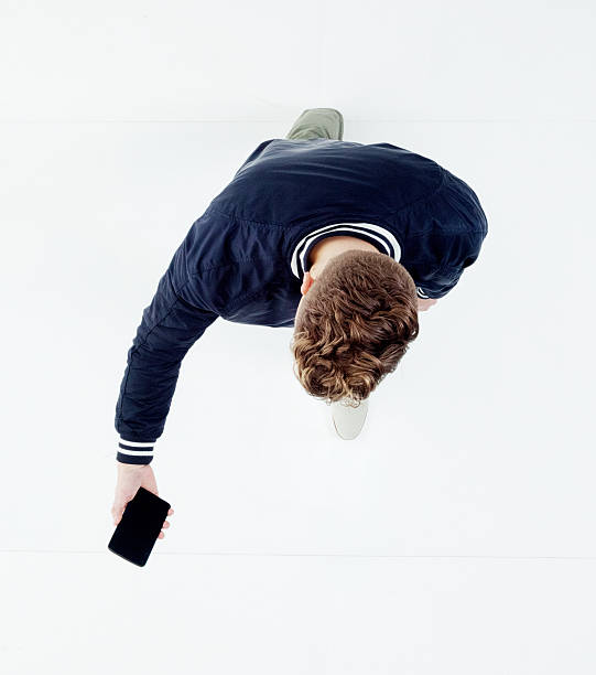 istock Top view of man using mobile phone 533331502