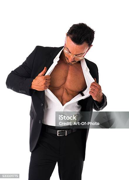 Businessman Opening His Shirt Revealing Muscular Torso Stock Photo - Download Image Now